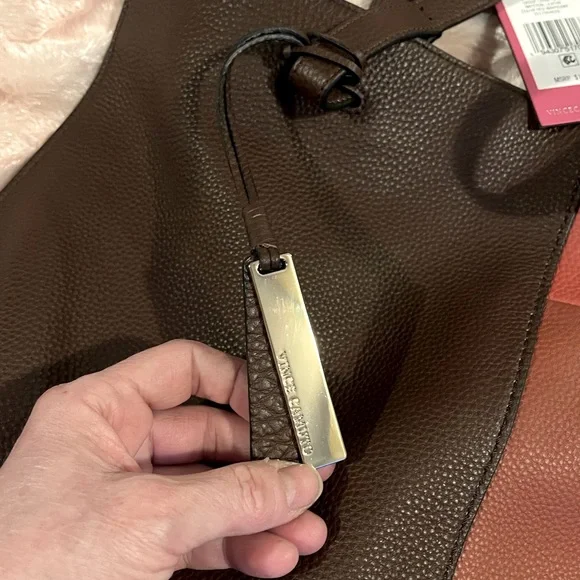 NWT large w/dust bag.   NEVER WORN RETAIL $198….temp.price cut for  auction - Picture 11 of 16